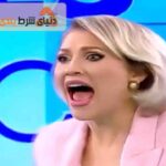 حمله فرد برهنه به مجری سکسی رومانی در برنامه زنده !